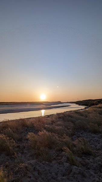 Sunset over the coastal landscape at Pedra do Sal.