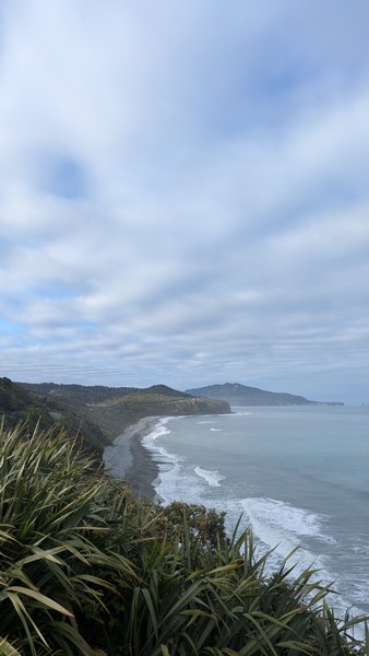 Elevated view of Nine Mile Beach showing the coastline and breaking waves. — Nine Mile (Runanga), Runanga, West Coast, New Zealand