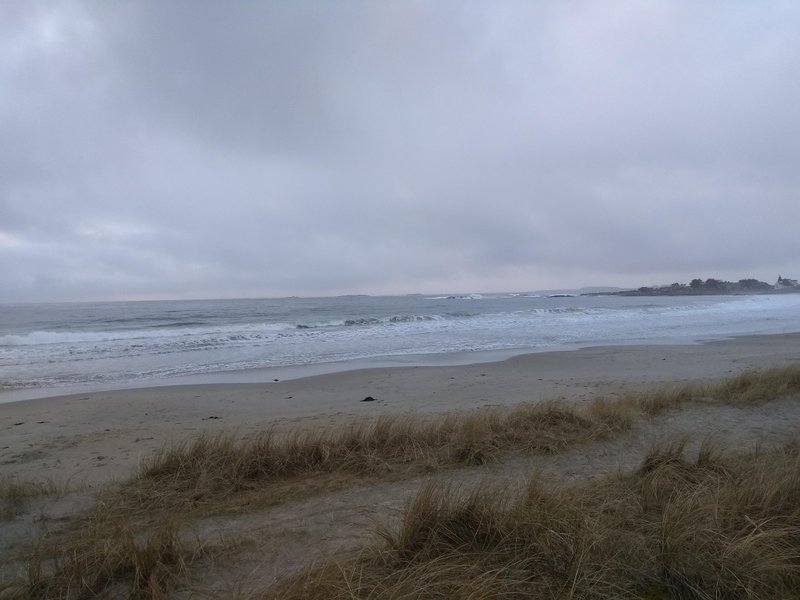 A wide view of the sandy beach and waves at Solastranden under a cloudy sky. — Solastranden (Sola Coast), Sola, Norway