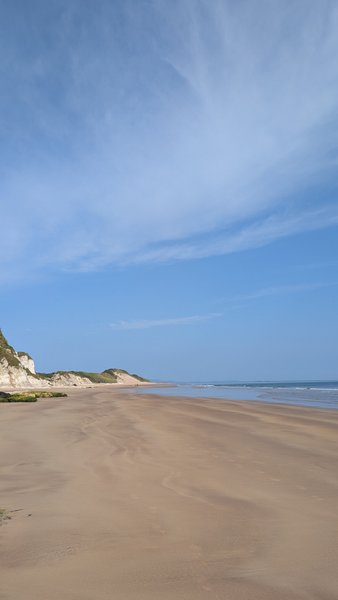 A wide view of the sandy beach and white cliffs at Portrush. — As Rochas Brancas (Portrush), Portrush, Northern Ireland, United Kingdom