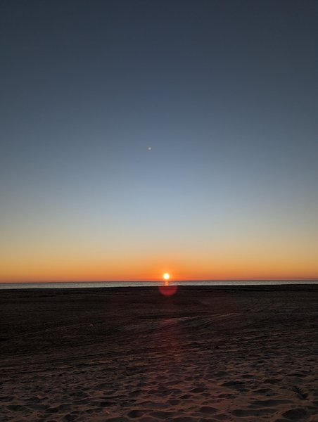 A sunset over the beach and sea at Matalascañas. — Matalascañas (Costa de El Condado), Almonte, Andalusia, Spain