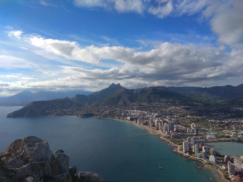 A wide aerial view of Calpe bay showing the coastline and surrounding mountains. — Cantal Roig (Calpe), Calp, la Marina Alta, Spain