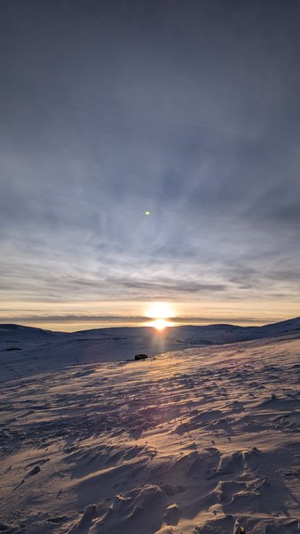 Sunset over the snowy landscape of Halnetunga.