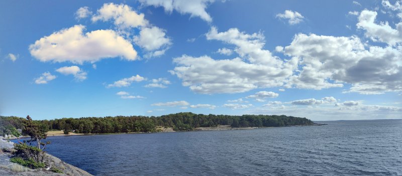 A wide view of the water and wooded shoreline at Sternö Badplats. — Sternö Badplats (Karlshamn), Karlshamn, Sweden