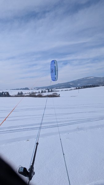 POV shot of snowkiting over the frozen fields of Orava. — Kapliczka Orava, Oravské Veselé, Slovakia