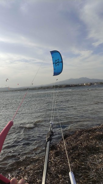 A POV view of a kitesurfing kite and lines at Nissakia Loutsa.
