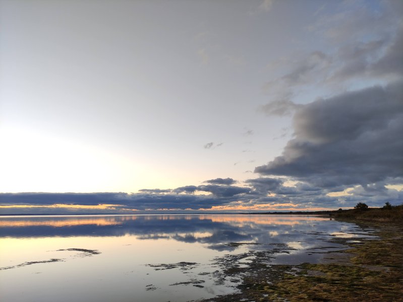 A calm sunset over the shallow waters of the Hel Peninsula near Jastarnia. — Jastarnia (Hel), Jastarnia, Pomeranian Voivodeship, Poland