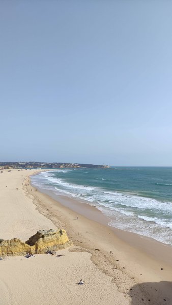 A high-angle view of the sandy shoreline and ocean at Praia da Rocha. — Praia da Rocha (Lagoa), Lagoa, Portugal